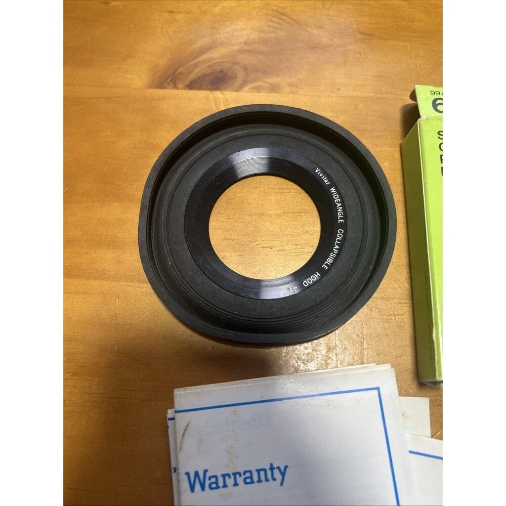 Vivitar super wide angle collapsible lens hood. 49mm thread. New